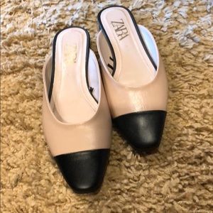 Blush/ black slides.. very Chanel